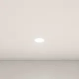 Stor badrumsinspiration med grå underskåp med integrerat handtag, snyggt sidomonterat handfat, fyrkantig spegel med rundade hörn, väggar i betonglook och råa material för en urban look