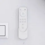 Stor badrumsinspiration i nordisk stil med badrumsmöbler i ljusblå färg och träbänkskiva med elegant fristående handfat, fiskbensgolv i trä som skapar en ljus och klassisk stil